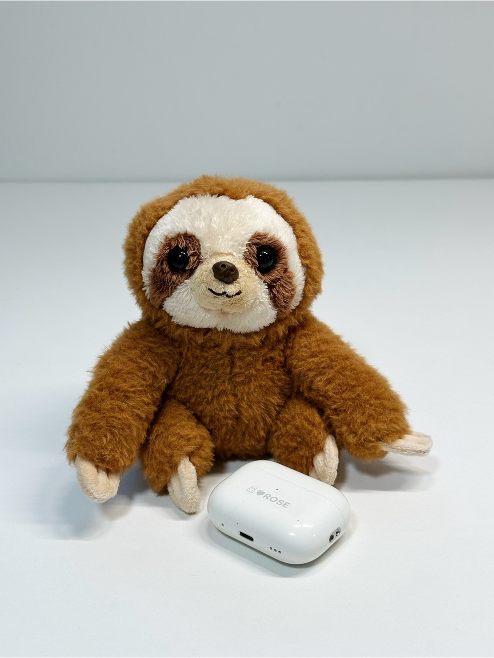 Brown Plush Toy with Yellow Branded Tag